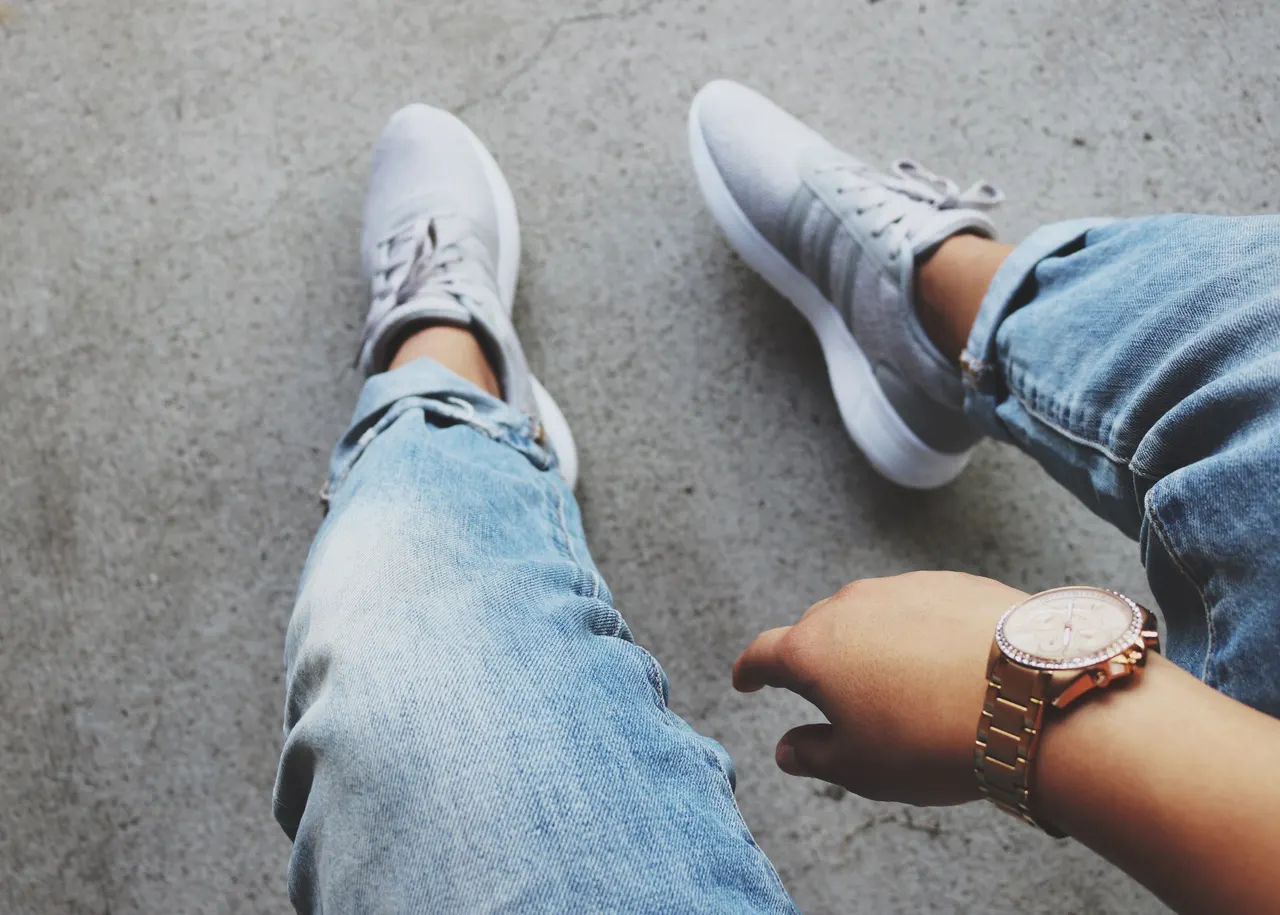 Photo with trousers, sneakers and watch