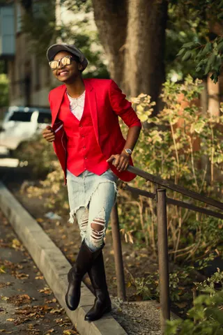 Photo with trousers, jacket, hat, necklace and boots