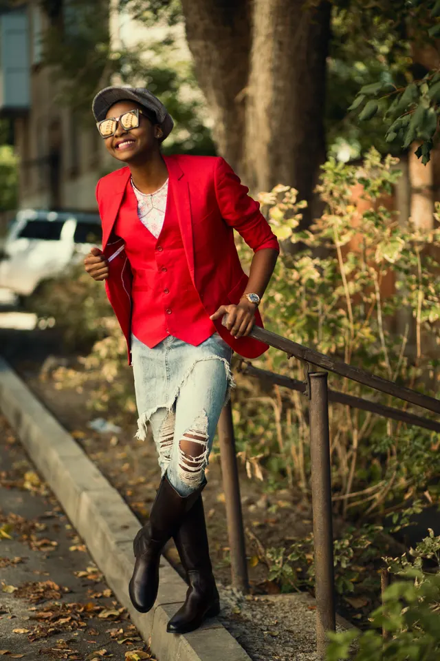 Photo with trousers, jacket, hat, necklace and boots