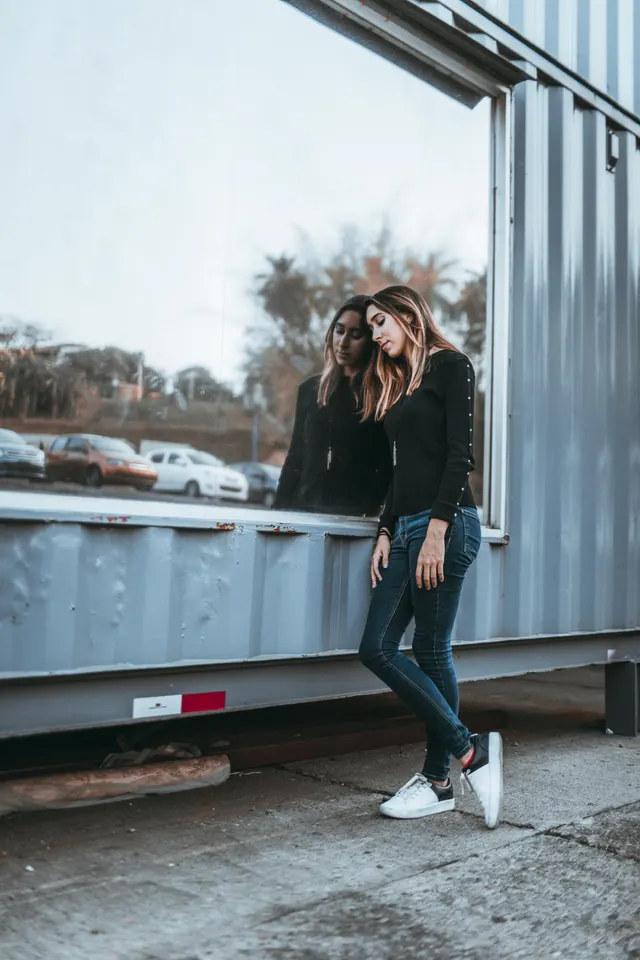 Photo with trousers, jackets, sweater and sneakers