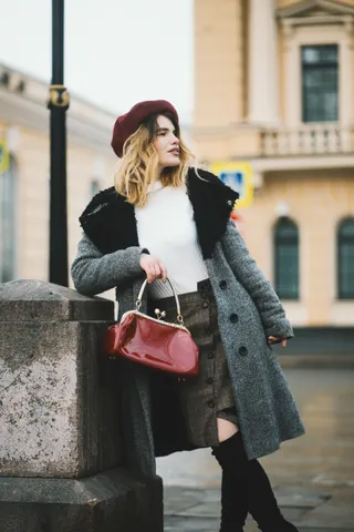 Photo with coat, hat, footwear and handbag