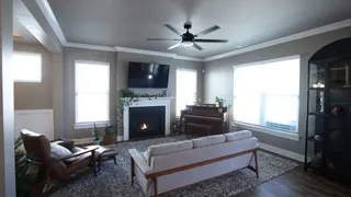 Video with fan, cabinet, plant, piano, chair, sofa and bench