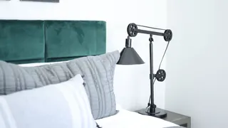 Video with bed, lamp and pillow