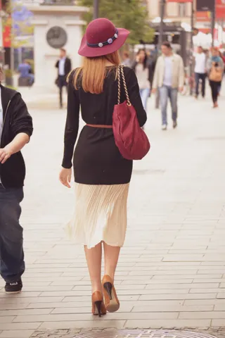 Photo with fancy dress, shirt, sneakers, high heels, hat and handbag