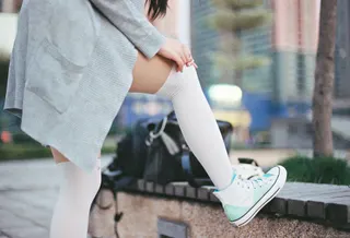 Photo with sweater, sneakers, handbag and sock
