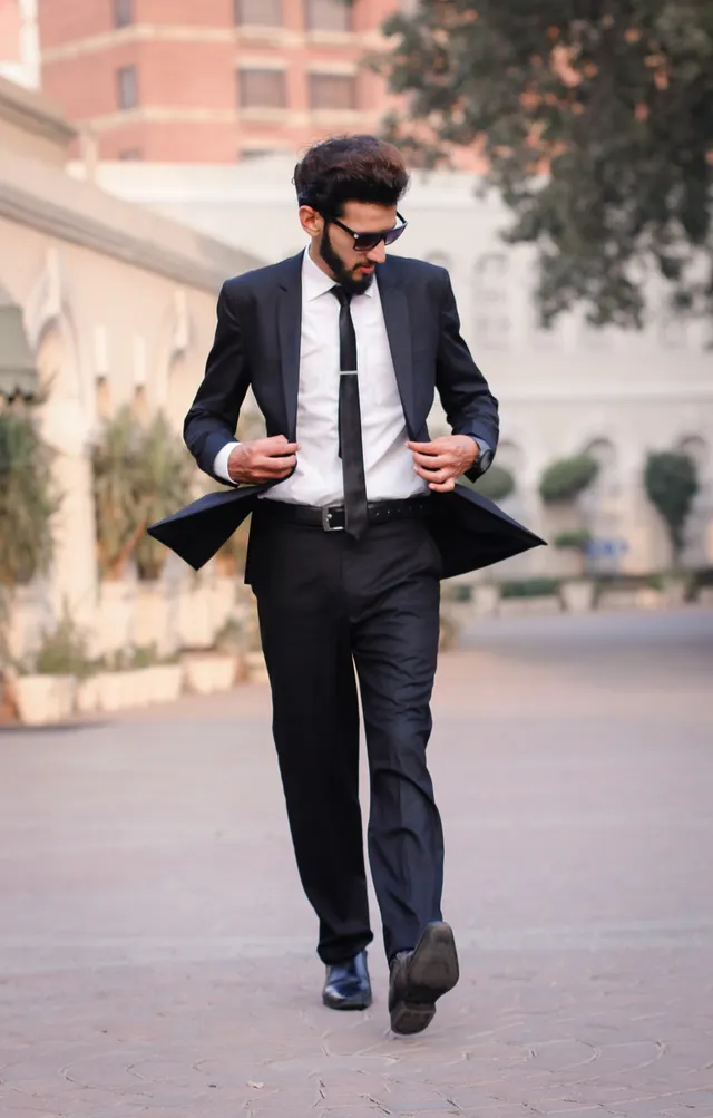 Photo with trousers, shirt, belt, leather shoes and glasses