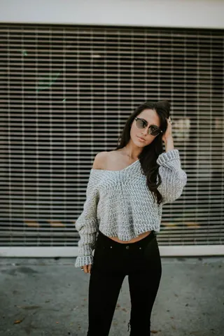 Photo with sweater, trousers and glasses