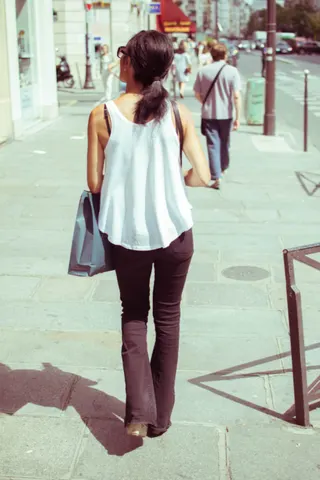 Photo with tank top, trousers, footwear and handbag