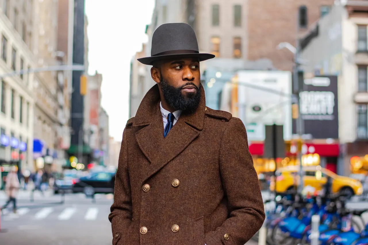 Photo with brown coat and hat