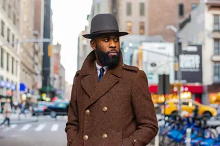 Photo with brown coat and hat