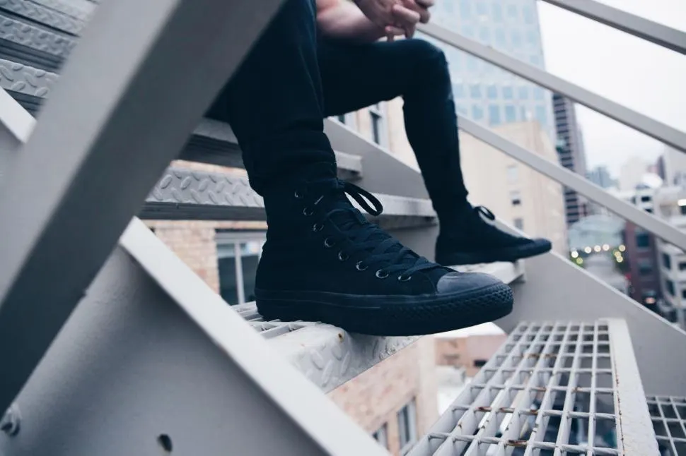 Photo with trousers, footwear and window