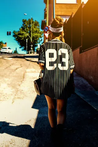 Photo with fancy dress, handbag, headband, footwear and street light