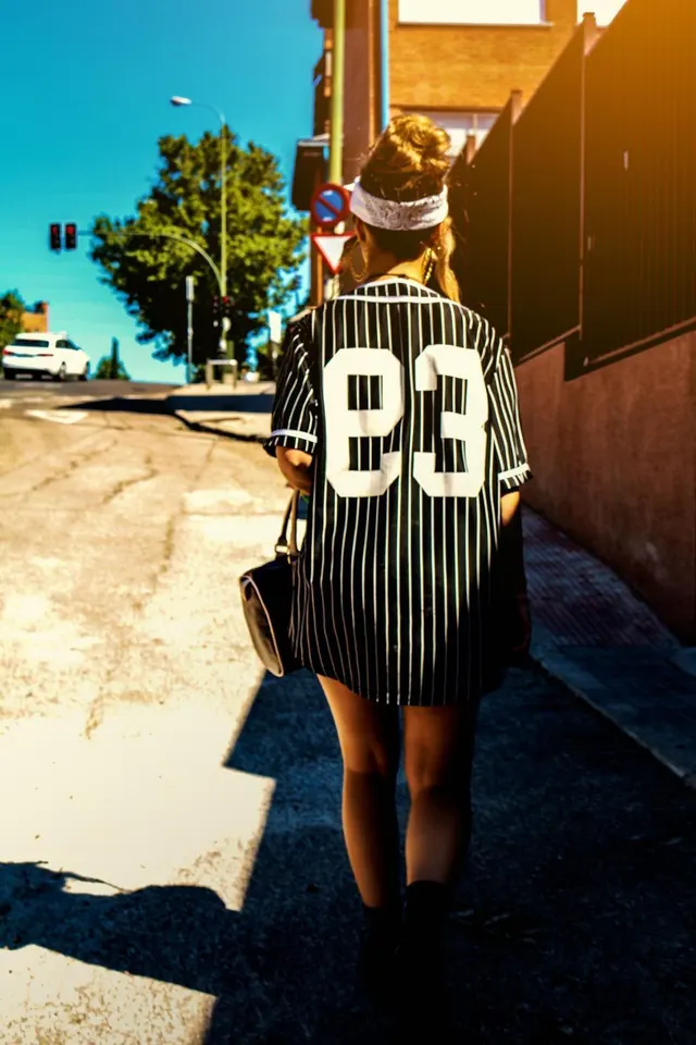 Photo with fancy dress, handbag, headband, footwear and street light