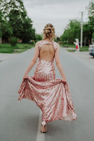 Photo with dress, high heels and necklace