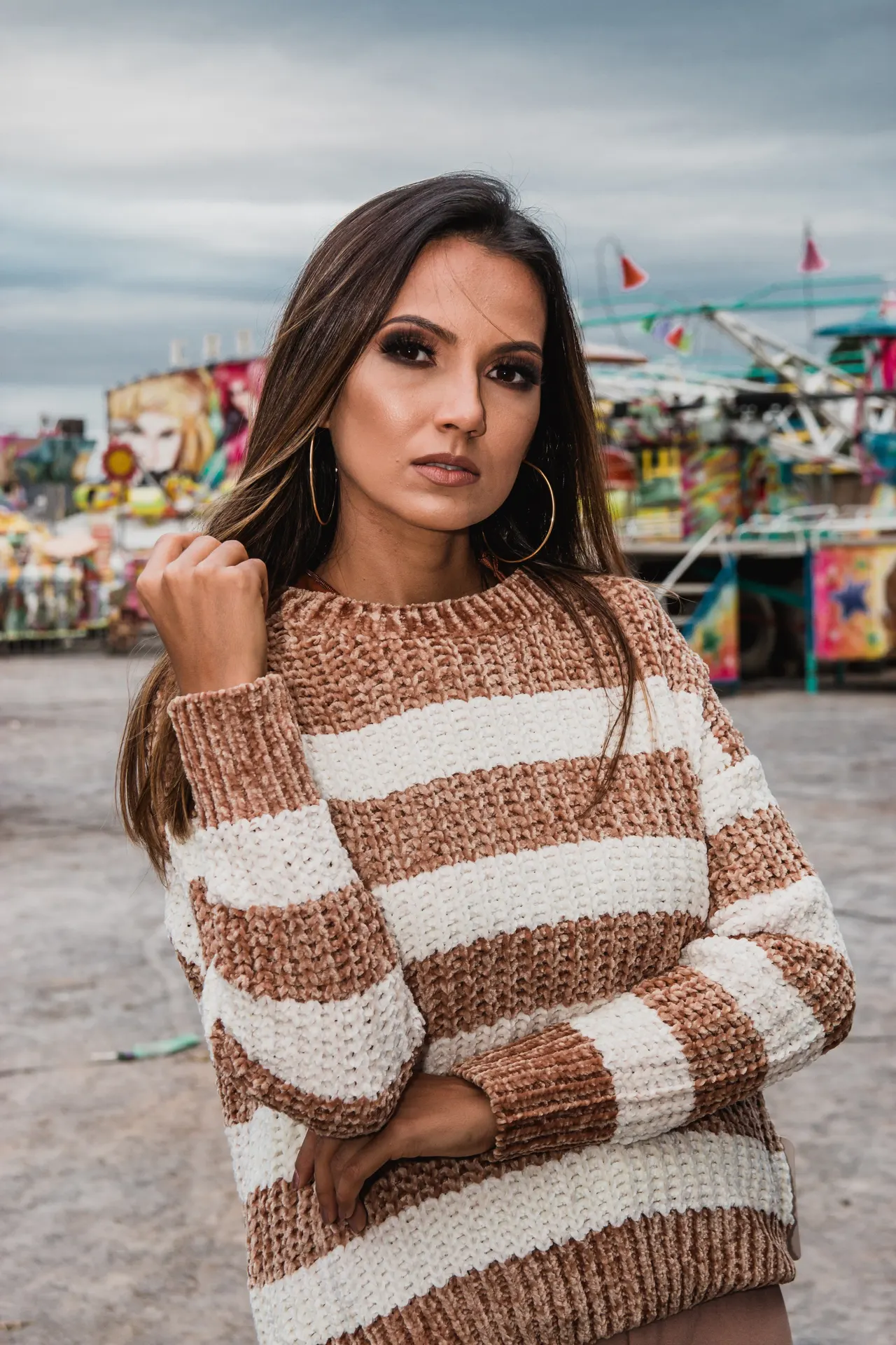 Photo with sweater and hoop earrings
