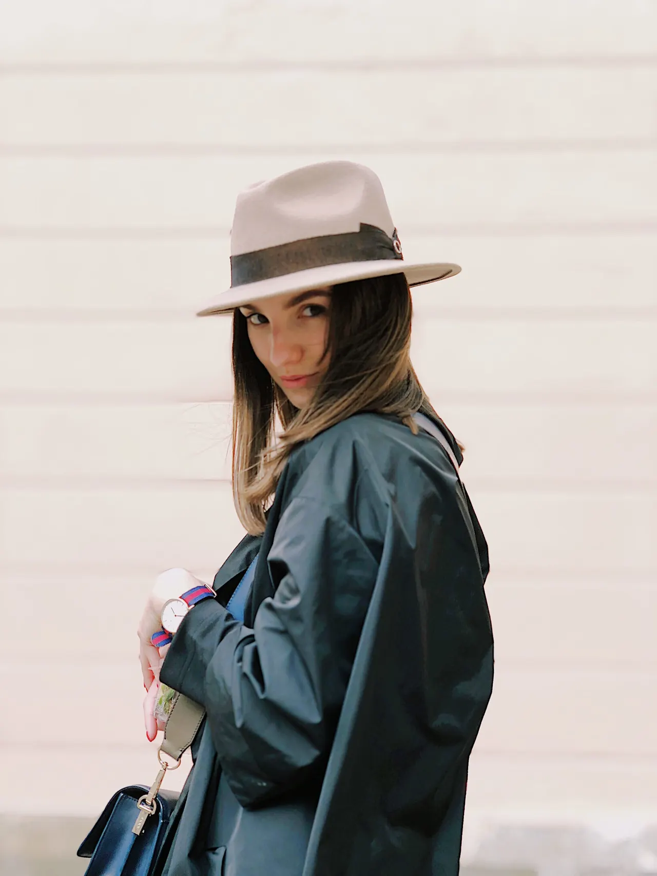 Photo with jacket, handbag and fedora