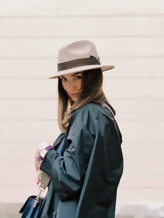 Photo with jacket, handbag and fedora