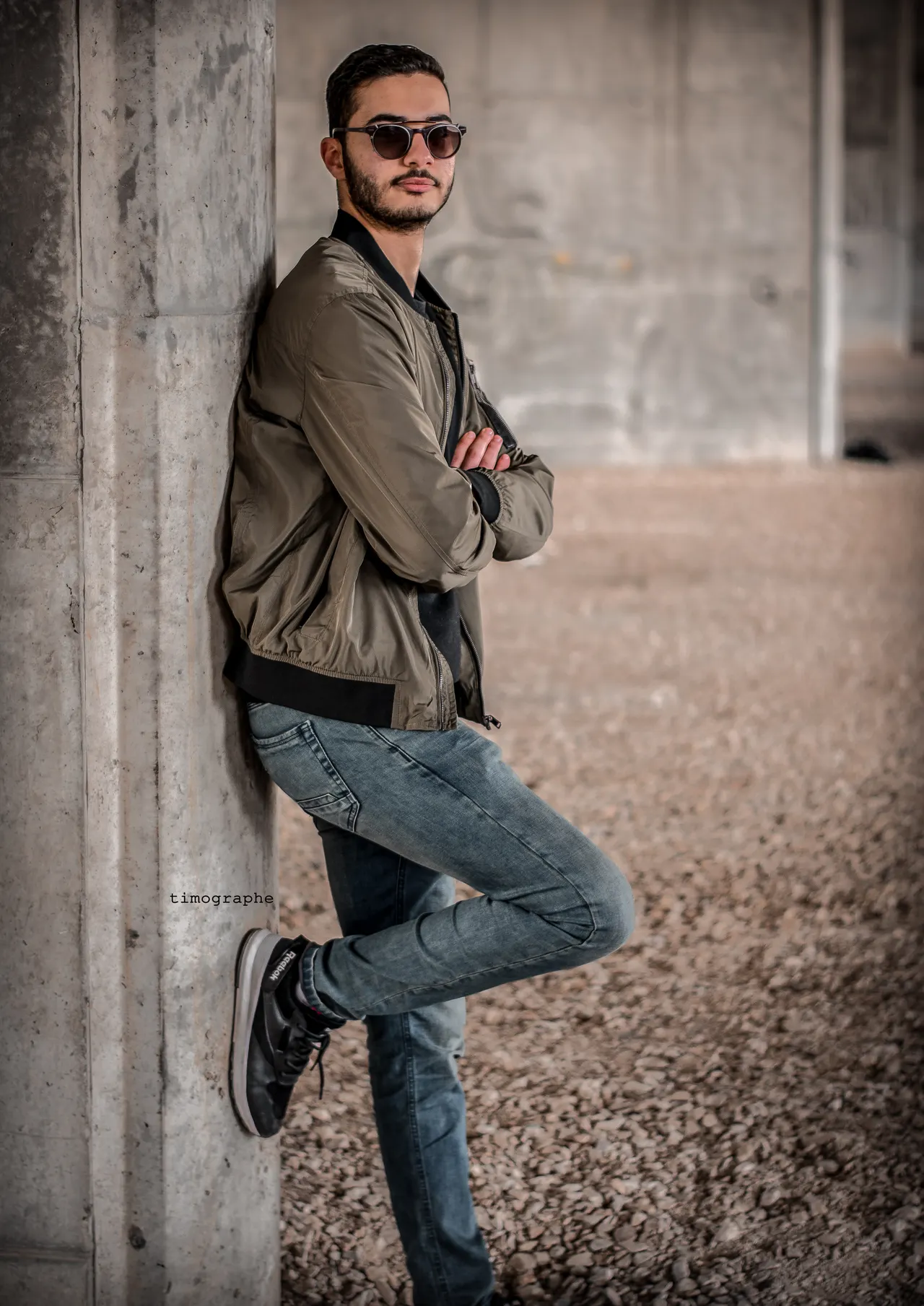 Photo with jacket, trousers, sneakers and glasses