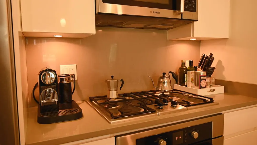 Video with cabinet, kitchen appliance, teapot and box