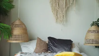 Video with lamp, plant, bed and pillow