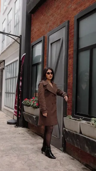 Video with window, coat, plant and shoes