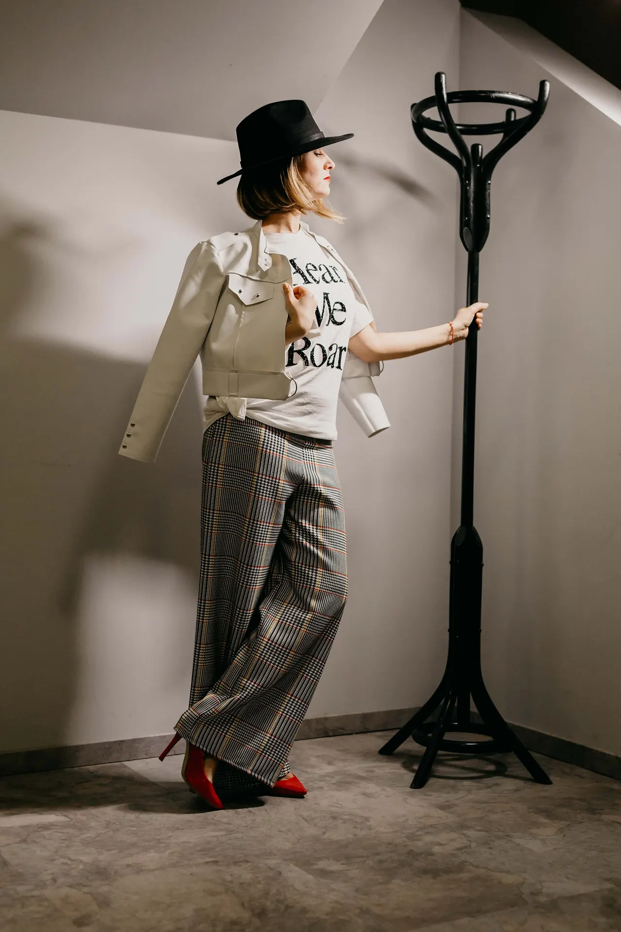 Photo with trousers, shirt, high heels, walking shoe and hat