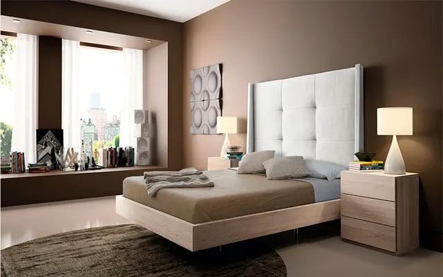 Photo with nightstand, bed, pillow and carpet