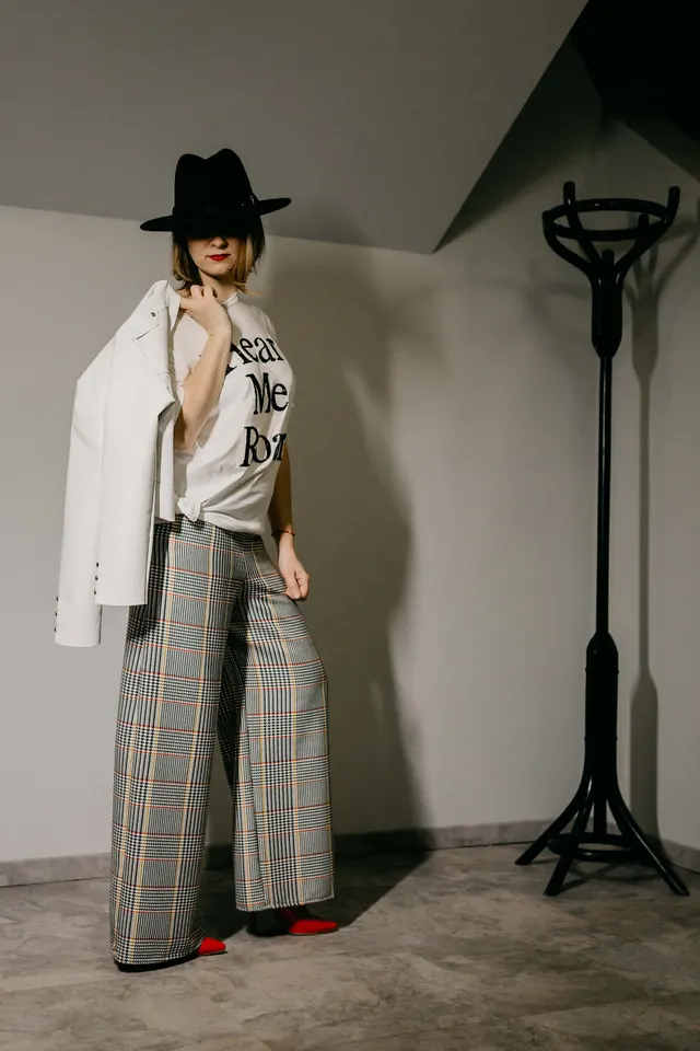 Photo with trousers, coat, walking shoe, footwear and hat