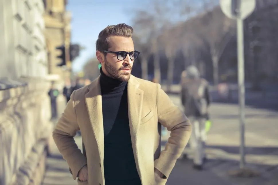 Photo with coat, glasses and stop sign