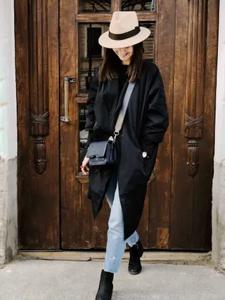 Photo with trousers, coat, hat, boots and purse