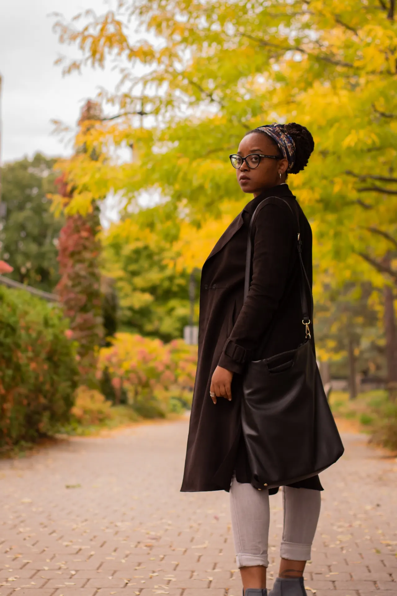 Photo with coat, glasses and headband