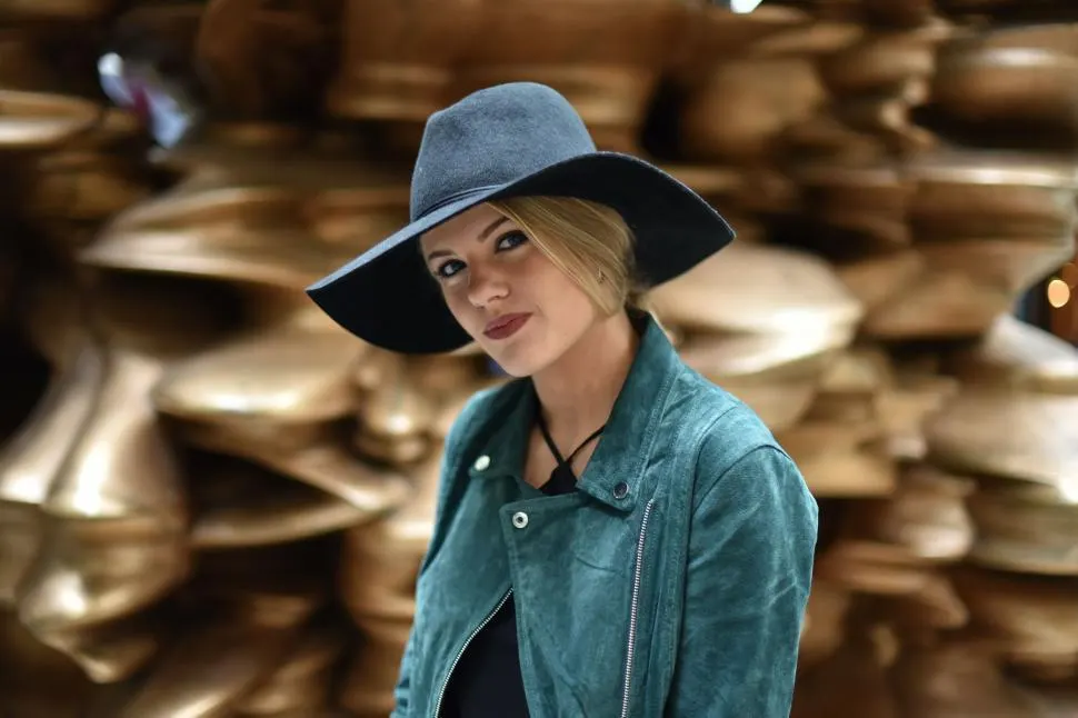 Photo with jacket, hat and cowboy hat
