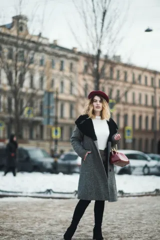 Photo with coat, footwear, handbag, hat and boots