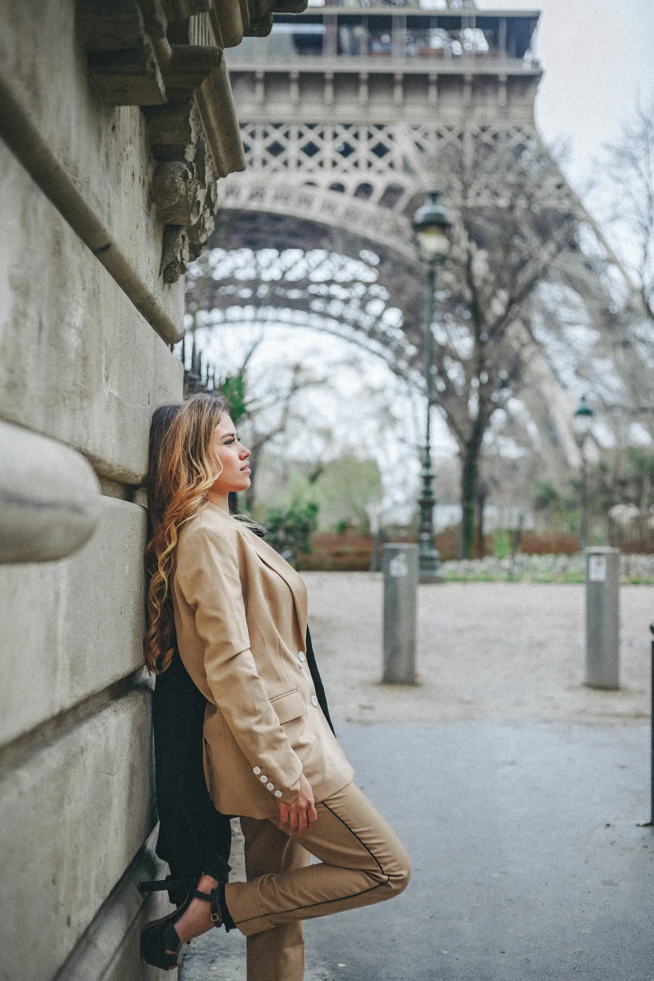 Photo with trousers, coat, high heels and street light